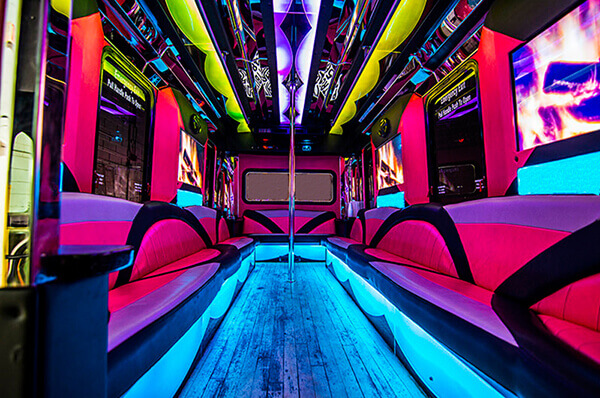 Inside a pink Party Bus