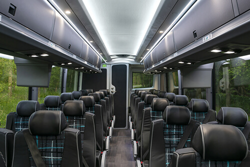 charter bus leather seats and onboard restroom
